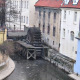 A water whell of a mill in a channel of the Vltava river.