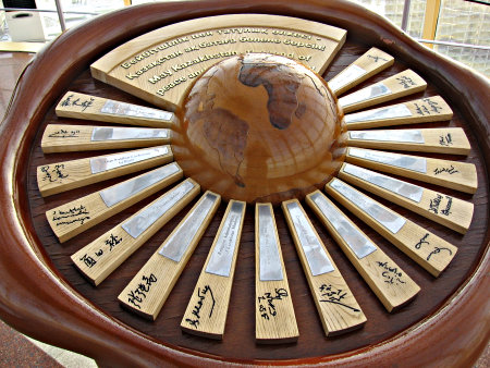 Wooden monument with the names of all religions present in Kazakhstan with the signature of their representatives.