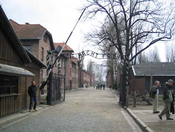 Auschwitz: main entrance and the camp's motto  "arbeit macht frei"